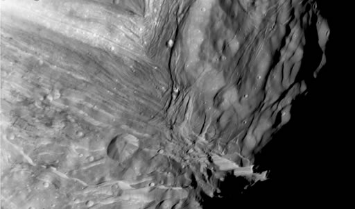Miranda Surface, Cliffs 10-15 kilometers (6-9 miles) high (NASA Voyager 2 mission)